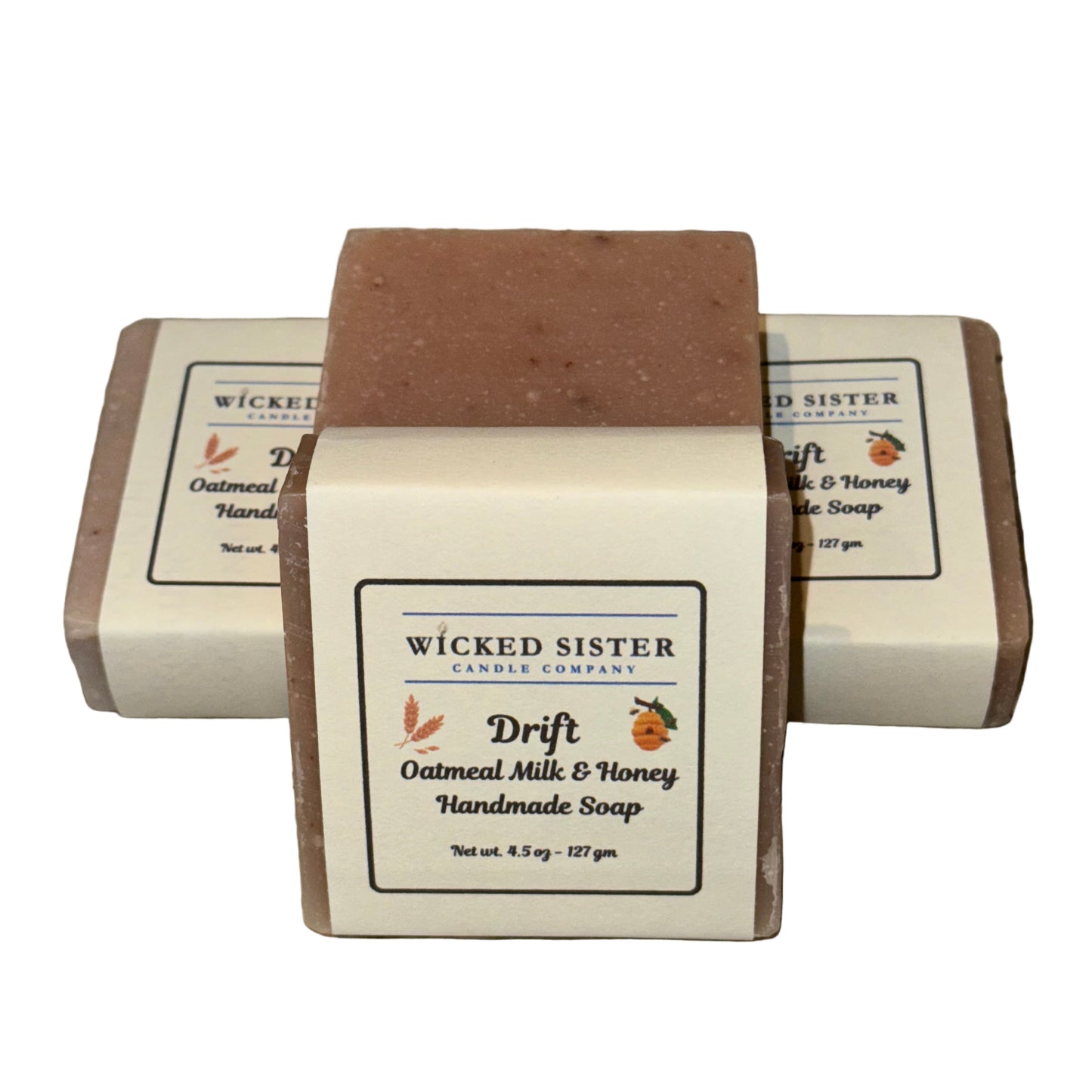 Three bars of oatmeal soap with 'Wicked Sister' packaging on a white background