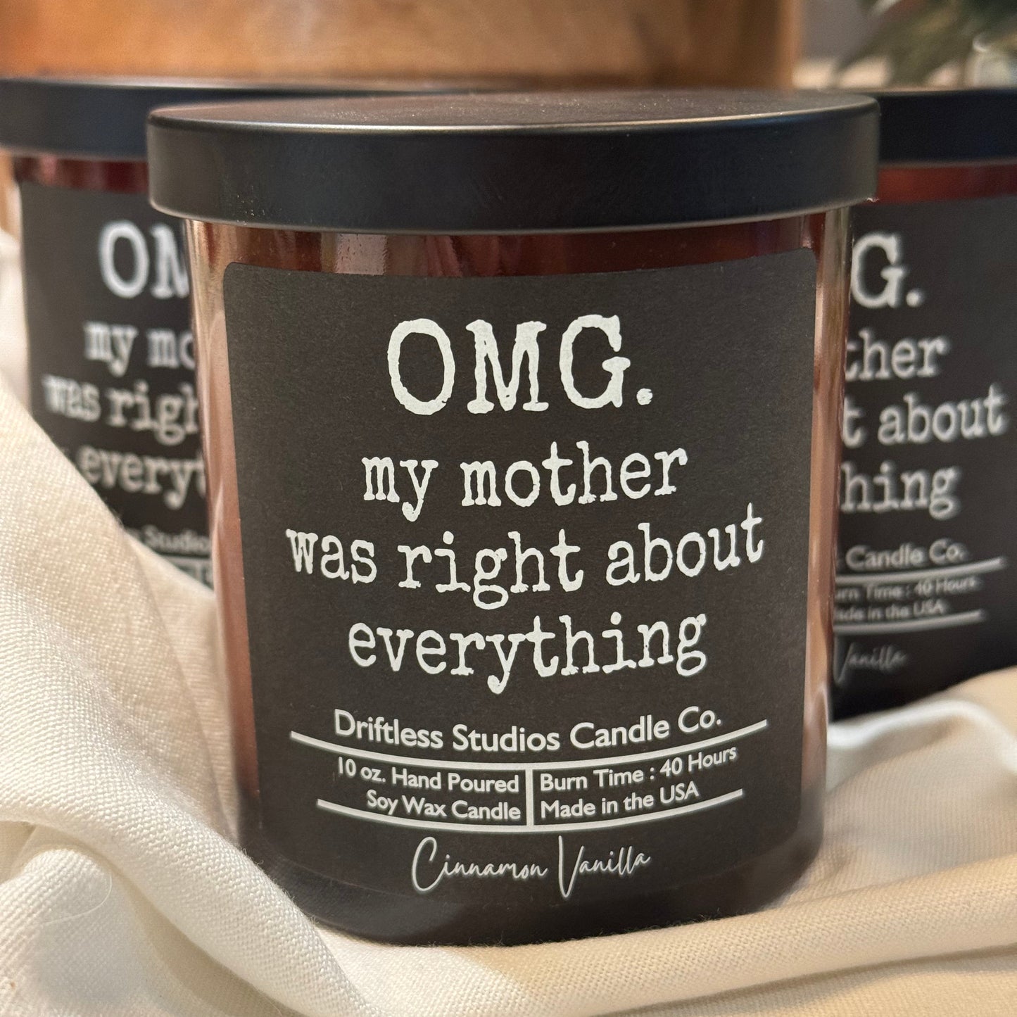 Soy wax candle OMG. My mother was right about everything' in amber glass jar