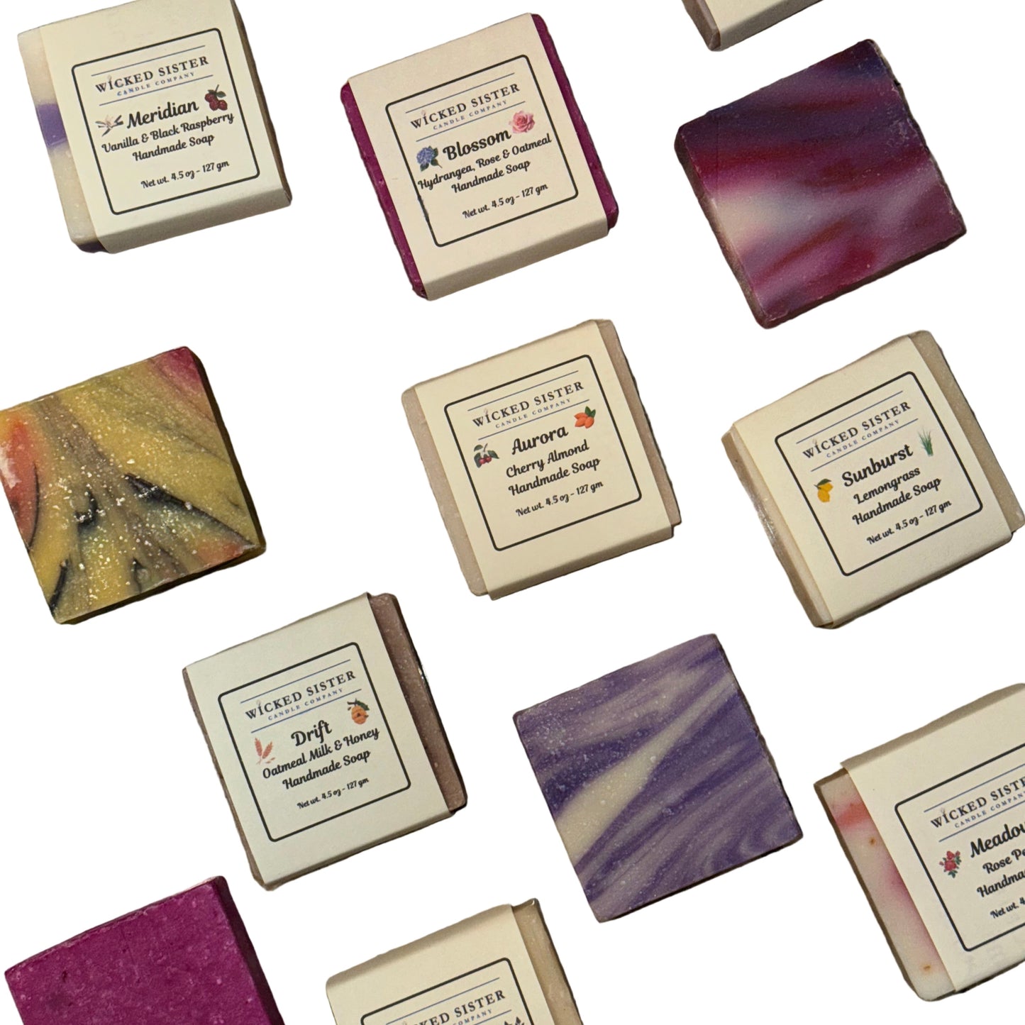 Assorted soap bars with visible brand name on a white background