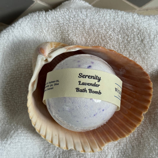 Serenity Lavender Bath Bomb in a shell on a towel