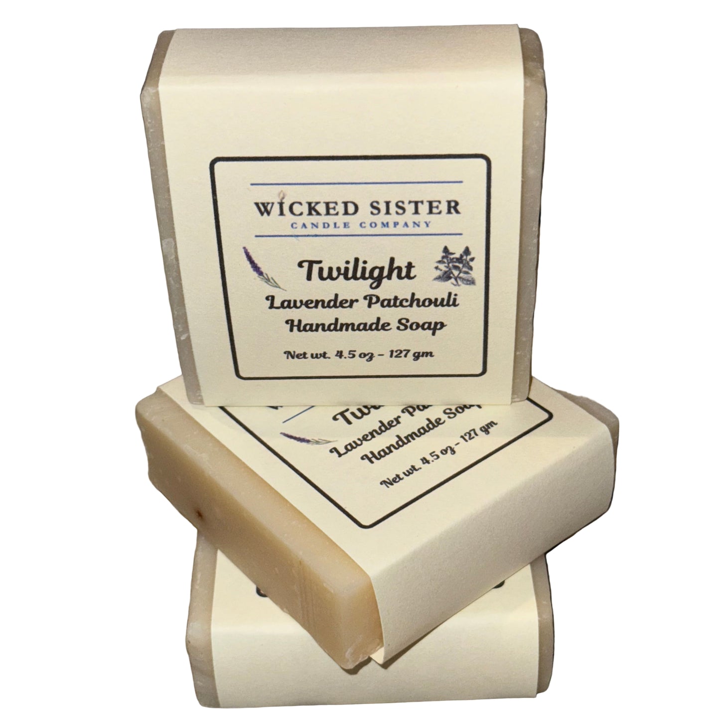 Handmade soap with a Wicked Sister Candle Company label on a white background