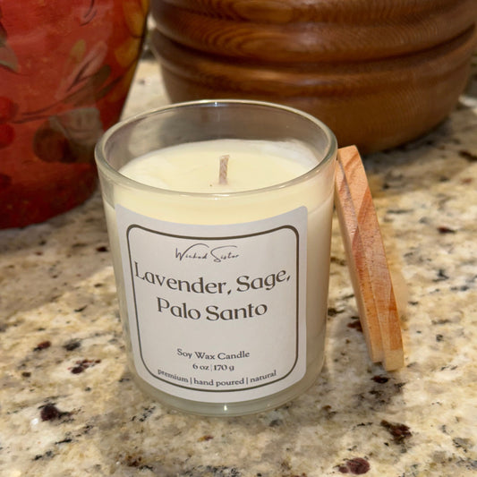 Lavender candle with a wooden lid on a granite surface