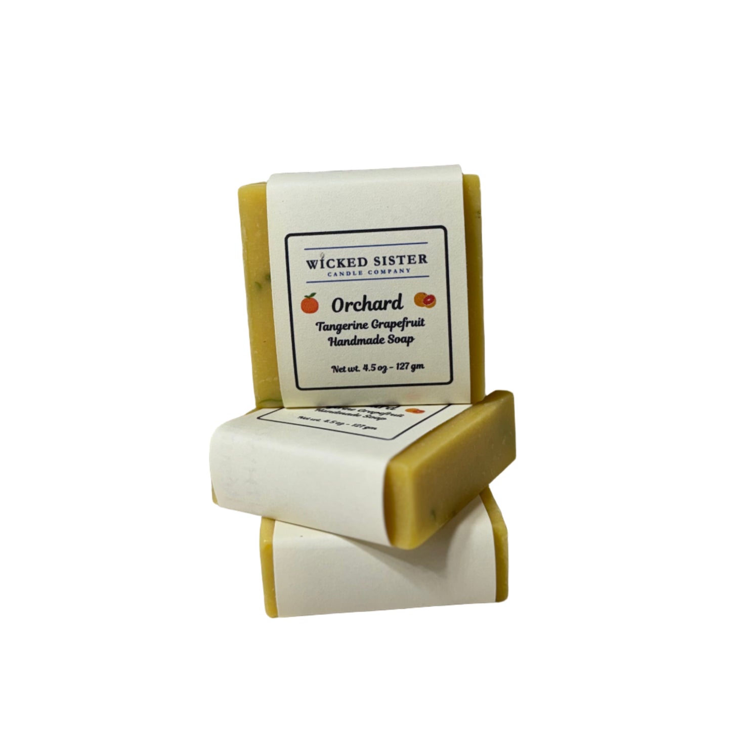 Three bars of citrus soap on a stand with 'Wicked Sister' label