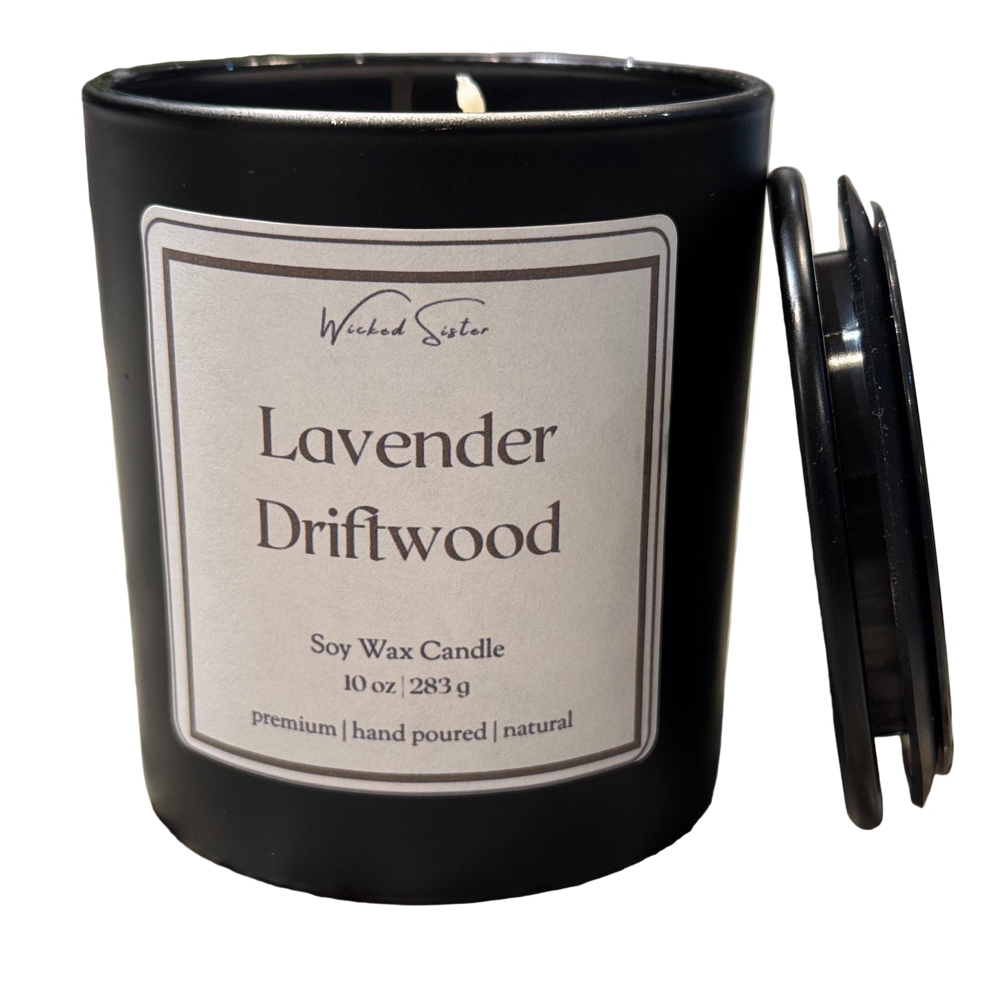 Black candle labeled 'Lavender Driftwood' 