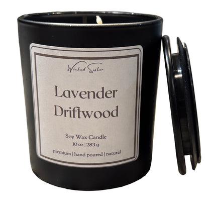 Black candle labeled 'Lavender Driftwood' 