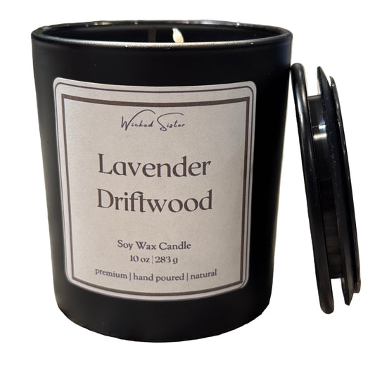 Black candle labeled 'Lavender Driftwood' 