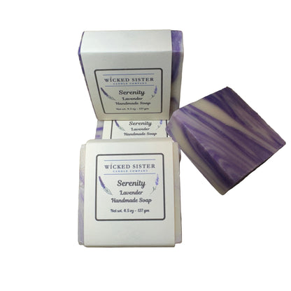 Two bars of Wicked Sister Serenity Lavender handmade soap on a white background.